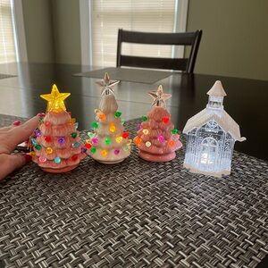 Colorful Ceramic Christmas Trees and Lighted Church